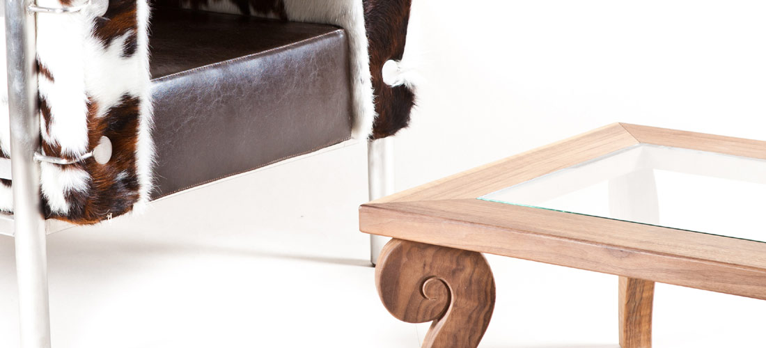 Coffee table in walnut and glass.