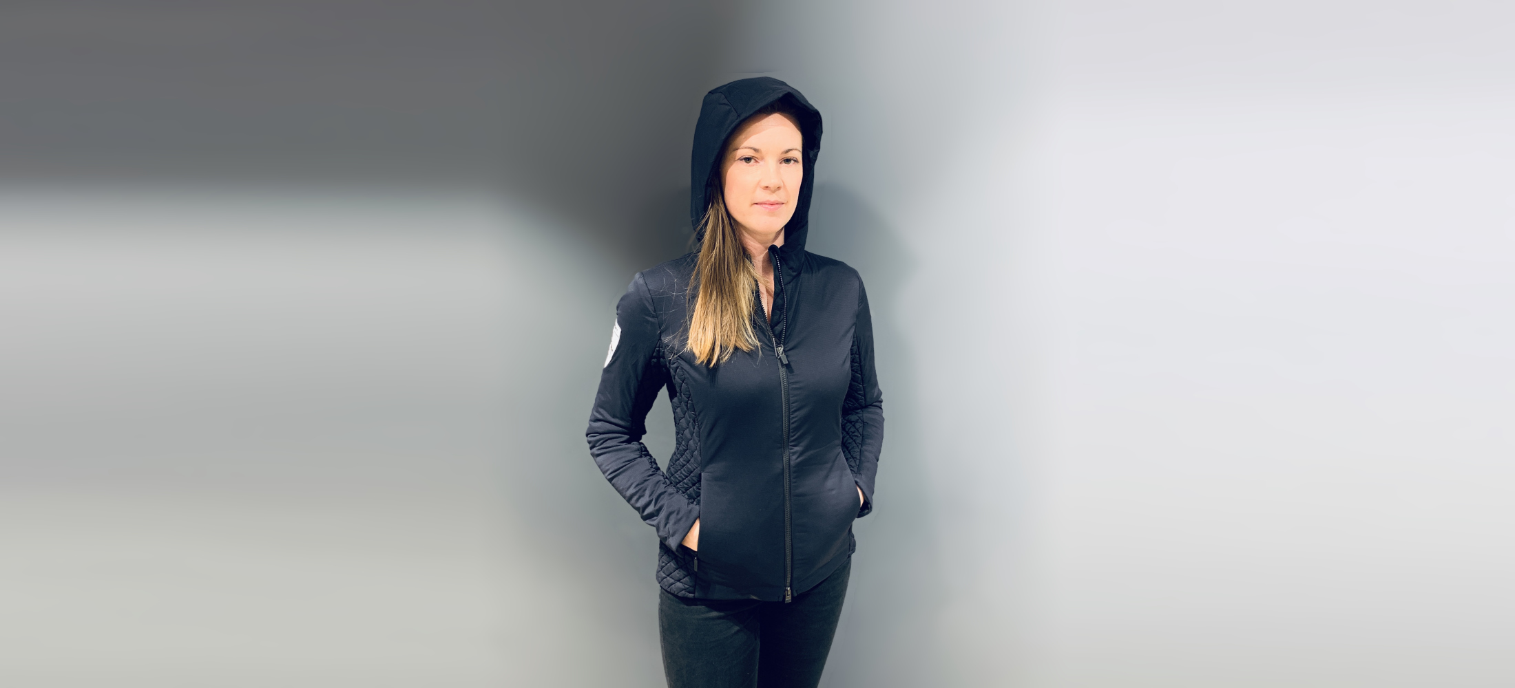 All-season, lightweight, hooded jacket has an understated design and a matte-shiny finish for a unique look. Perfect insulation piece to layer under a shell or to wear on its own.